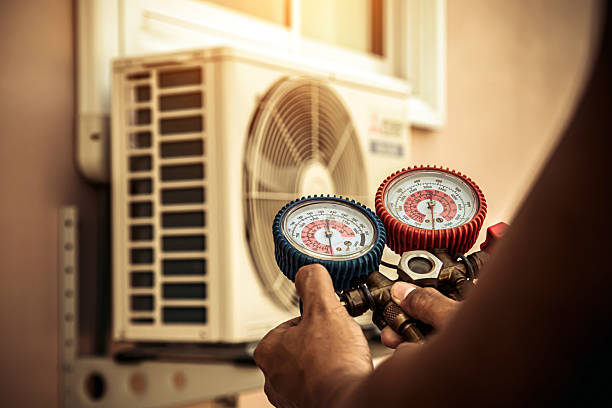 Professional Air Conditioning Service technician working in Alexandria, KY